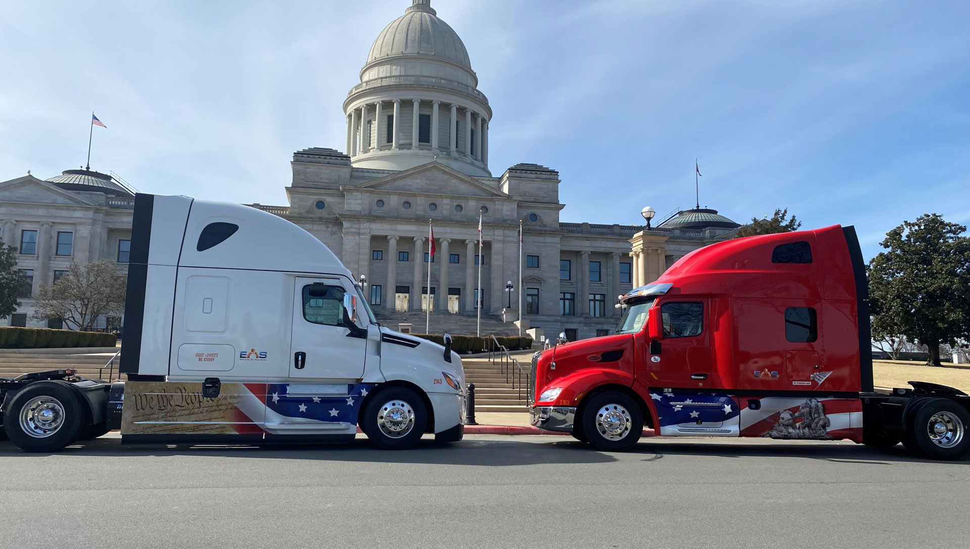 EOS Inc. trucks in front of capitol